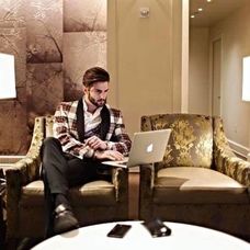 Guests on Laptop in Park Lounge