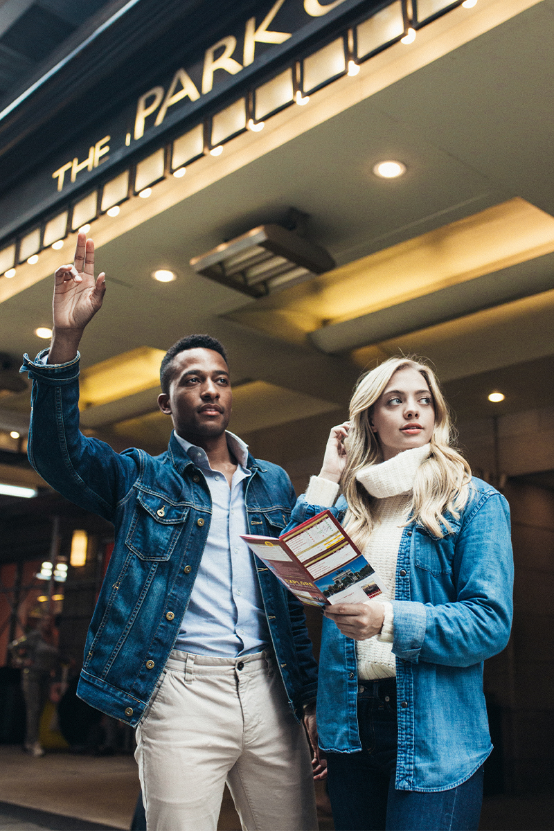 two people outside Park Central New York hotel