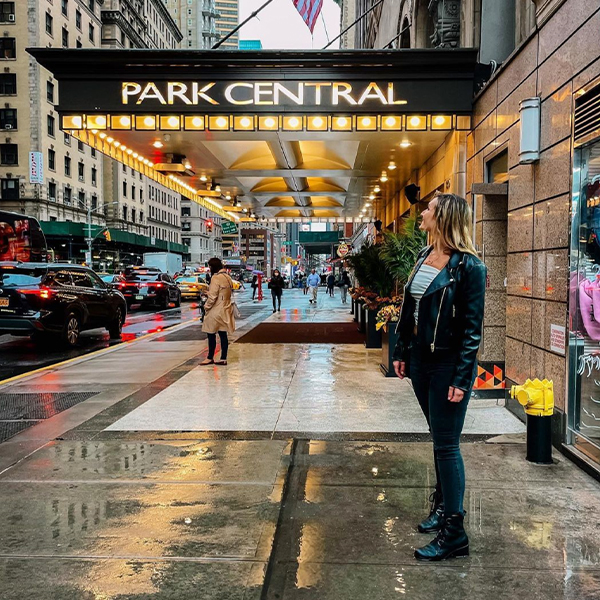 person standing outside Park Central New York hotel